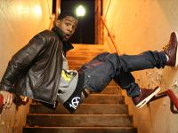 Two guys goofing off on a staircase