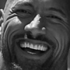 A laughing face captured in candid black-and-white