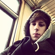 Hoodie selfie on the train, classic forum avatar vibe