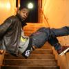 Chilling on the stairs in a leather jacket