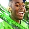 Smiling member pic with vibrant green splash effect