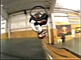 Skater catching air on a mini-ramp clip