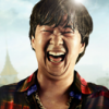 Laughing man mid-shot, candid tourist snapshot vibe