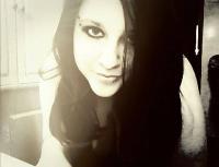 A member's old profile photo, sepia-toned selfie vibes