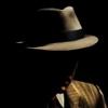 Mysterious figure in a fedora, noir vibes