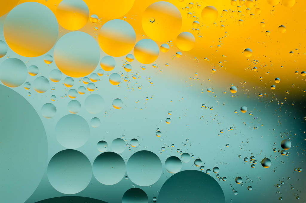 Bubbly macro art in golden and teal tones