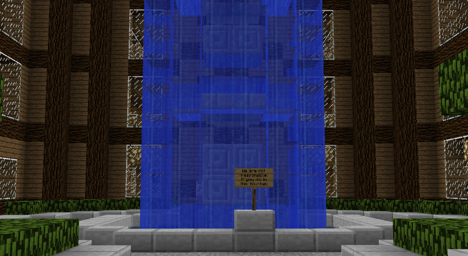 Minecraft fountain with a hilarious liability warning sign