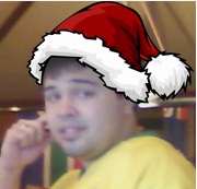 Santa hat photoshopped onto blurry webcam selfie