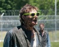 Zombie walk cosplay caught mid-groan on a sunny day