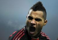 Intense soccer player mid-shout with mohawk hairstyle