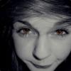 Grainy black-and-white close-up member avatar portrait