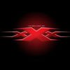 Glowing red XXX emblem burning against the dark