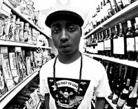 Snapback and chains in the liquor store aisle