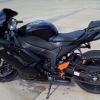 Black sport bike parked, a rider's pride and joy