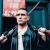 The Punisher poses menacingly with dual pistols