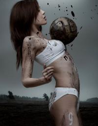 Gritty stylized GFX art — soccer ball, mud, and edge