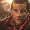 Rugged survivalist gazing intently into the wild