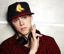 Guy in a Red Sox cap posing with headphones