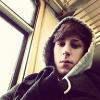 Member selfie on a train, early 2010s vibe