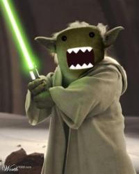 Domo-head Yoda mashup wielding a lightsaber