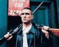 Tough guy movie still with dual pistols raised