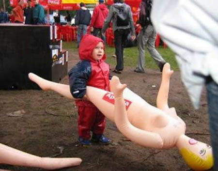 Kid awkwardly carrying an inflatable doll, classic forum lol