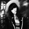 Moody black-and-white avatar of a girl in a hat