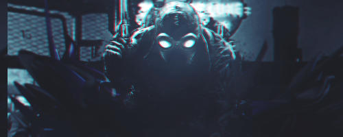 Glowing-eyed hooded figure emerges from the digital shadows