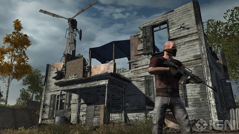Post-apocalyptic game screenshot, armed survivor near ruined windmill house