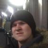 Member selfie in a beanie, casual candid shot