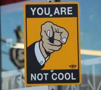 Classic 'You Are Not Cool' pointing finger meme sign