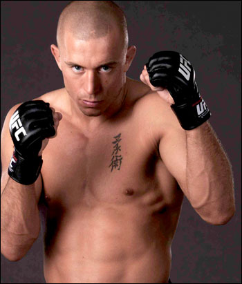 MMA fighter posing in gloves for the pic war