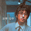 Moody blue-toned portrait avatar with Korean text overlay