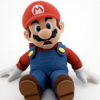 Mario plushie sitting, a childhood gaming classic