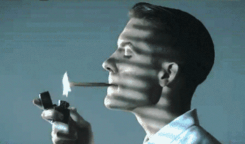 Guy lighting a cigarette, striped light effect