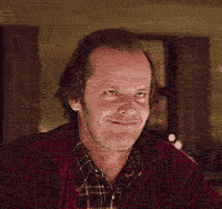 Grinning guy in plaid, an old forum avatar pic