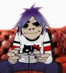 2D from Gorillaz gaming on a couch, classic avatar vibes