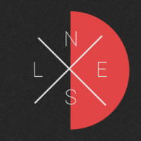 Minimalist compass design with crossed lines on dark texture