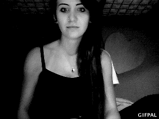 Grainy black-and-white webcam selfie from a forum raffle post