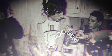 Moody vintage-style GFX portrait with headphones and grain effect